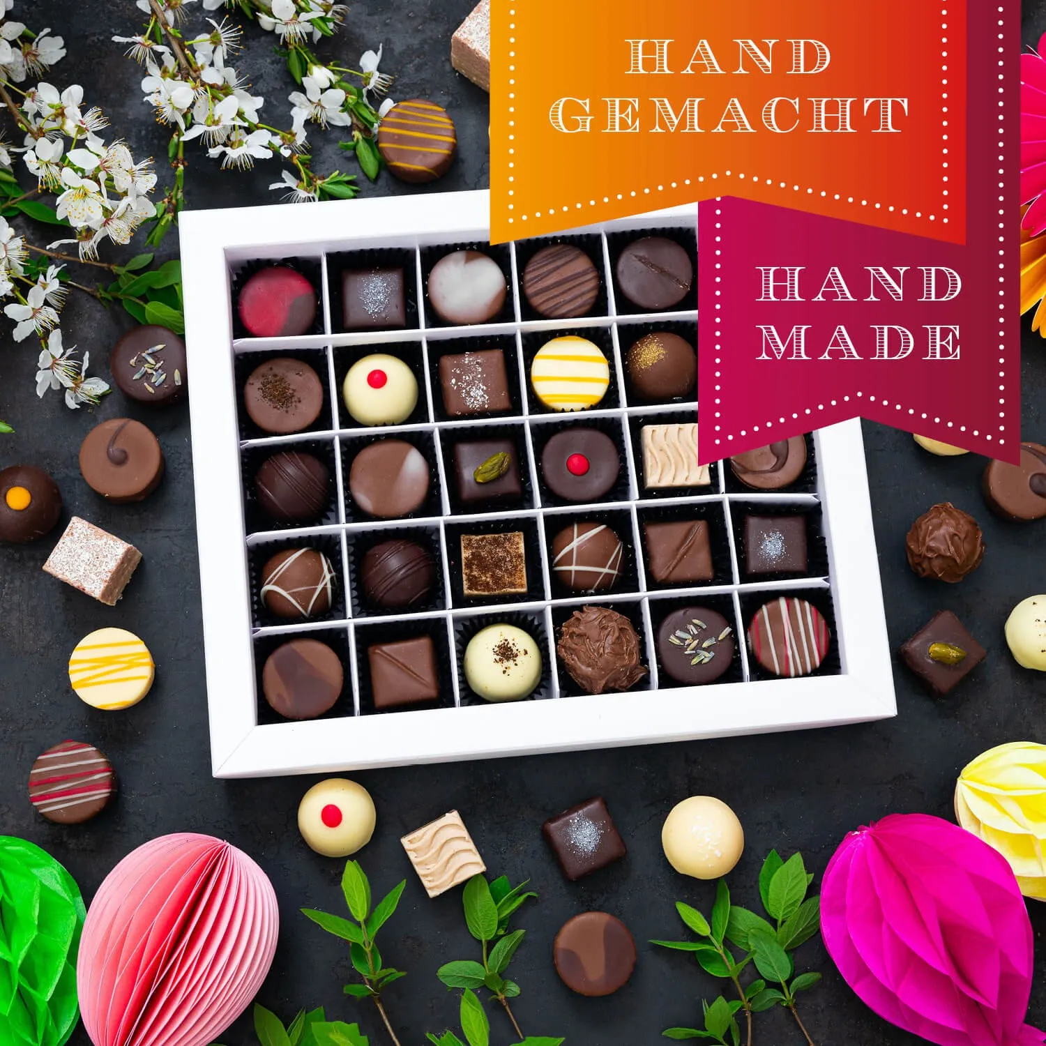 HANDWERK STATT MASSENWARE - Edition \Frohe Ostern pink\: Vergiss billig produzierte Standard-Pralinen mit schöner Verpackung - entscheidend ist nicht nur der erste Eindruck, sondern der Geschmack, der noch lange in Erinnerung bleibt