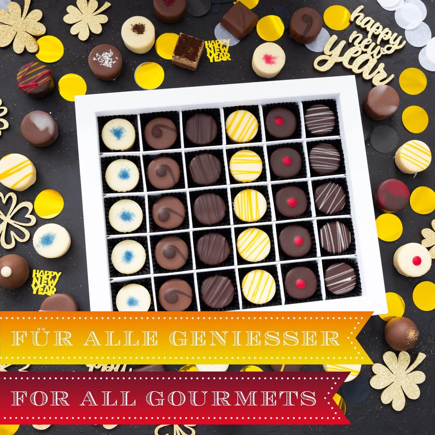 HANDWERK STATT MASSENWARE - Edition \Happy New Year\: Vergiss billig produzierte Standard-Pralinen mit schöner Verpackung - entscheidend ist nicht nur der erste Eindruck, sondern der Geschmack, der noch lange in Erinnerung bleibt