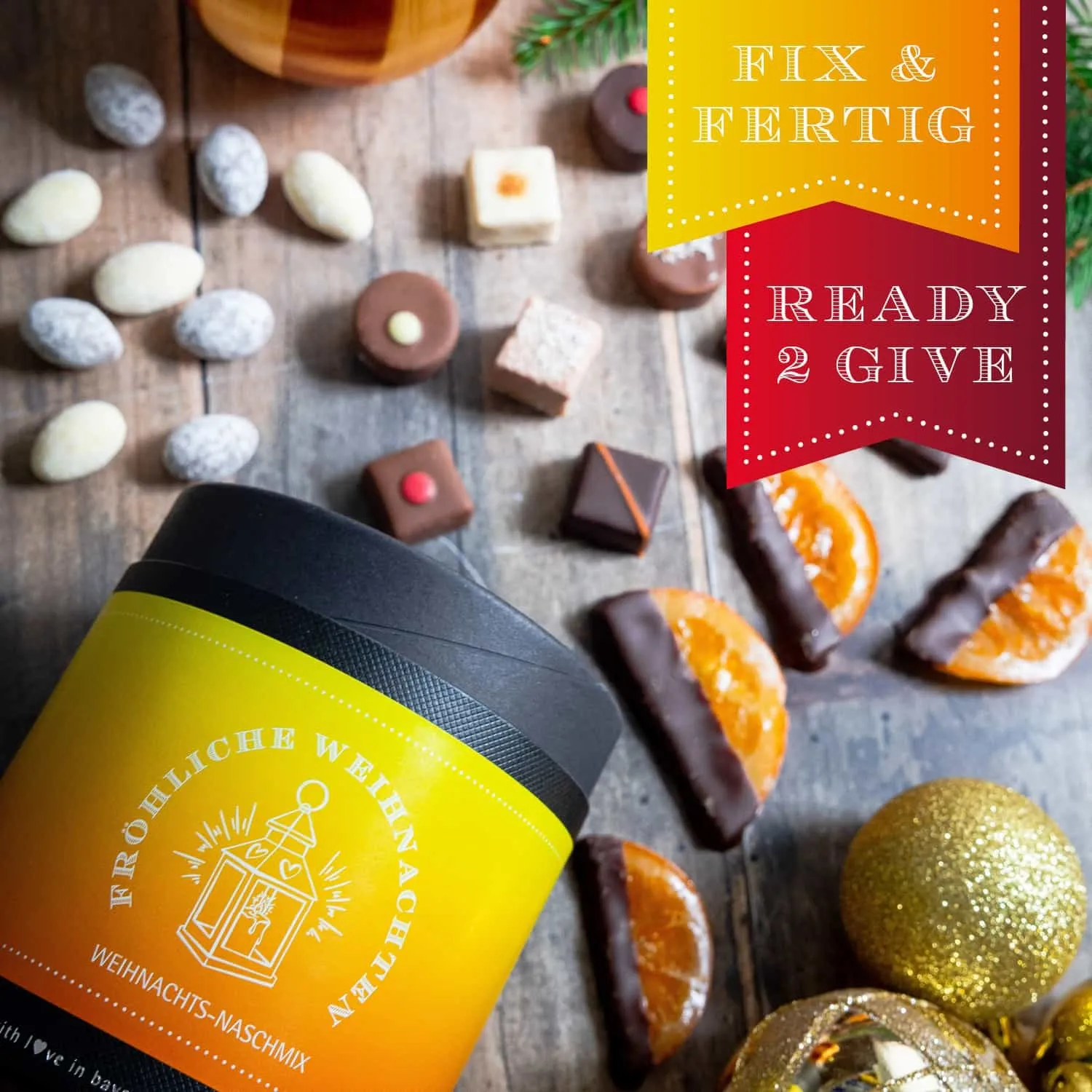 BESONDERS STATT GEWÖHNLICH - Edition \Fröhliche Weihnachten\: Während andere auf Masse setzen, entsteht echter Feinkost-Genuss durch perfekt abgestimmte Spezialitäten (großes Mitbringsel Pralinen Nougat-Mandeln & schokolierte Orangen)