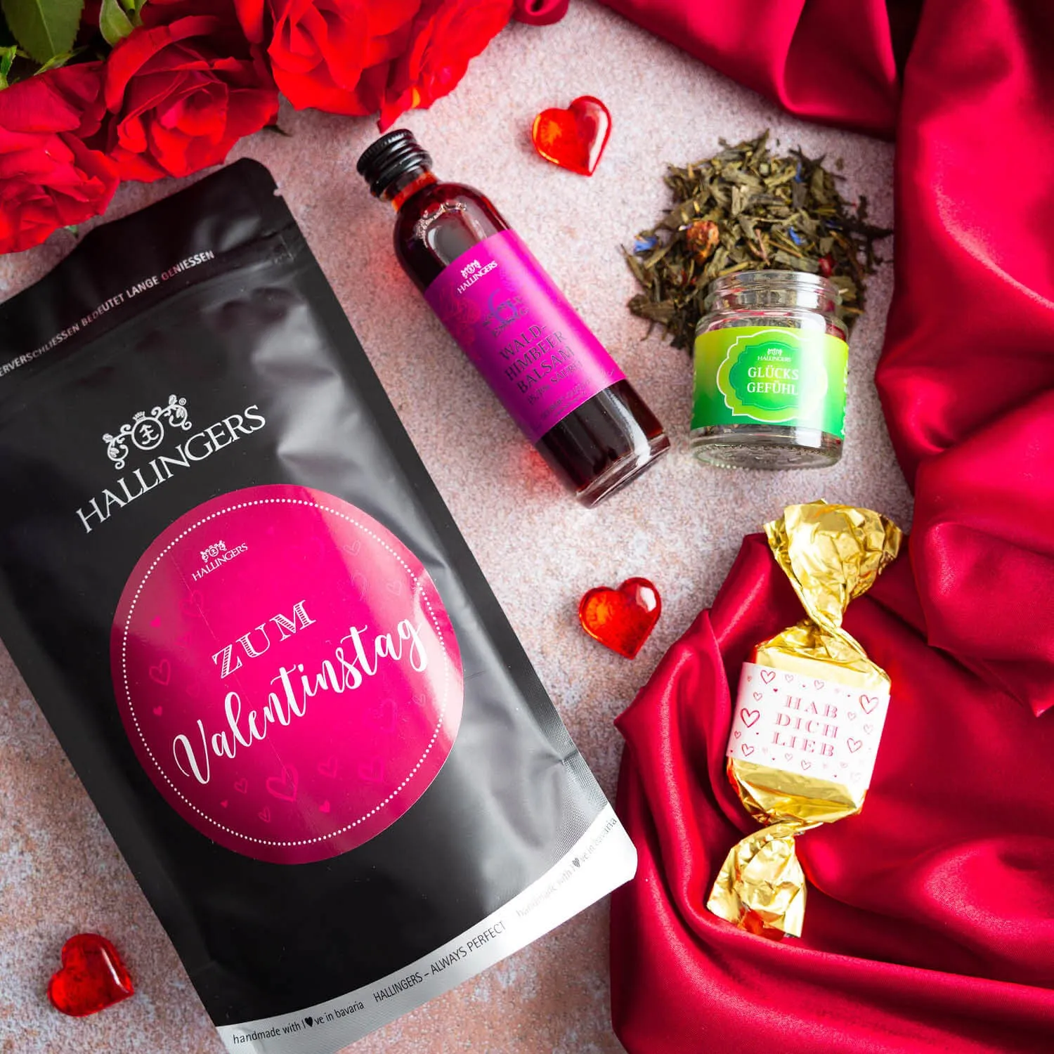Zum Valentinstag pink (kleiner Liebesgruß Nougat-Busserl Himbeerbalsam & Grüner Tee) - Feinkost-Set, Gourmet-Auswahl Wundertüte